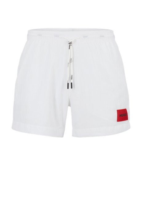 Quick-drying swim shorts with red logo label, White