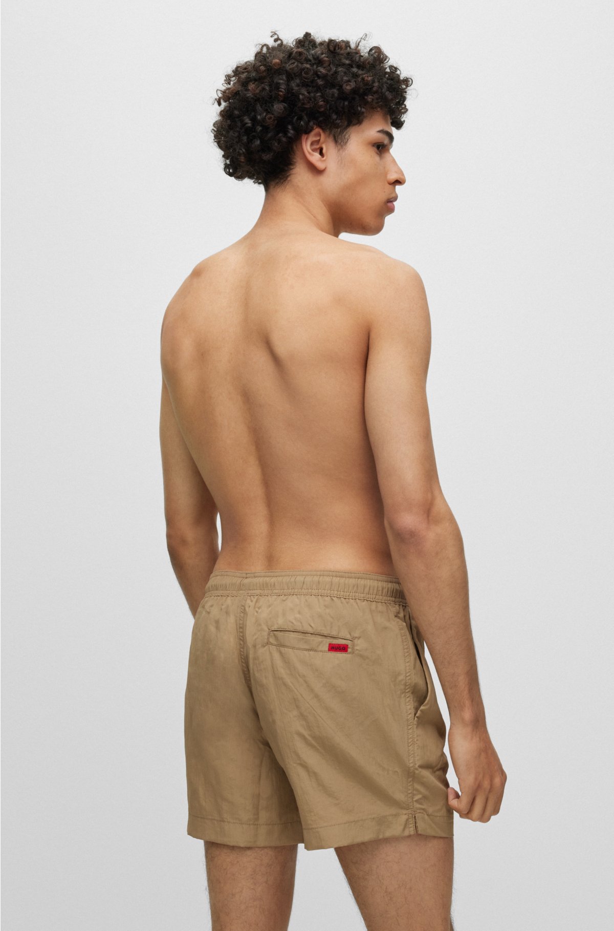ASOS DESIGN swim shorts in short length with toggle waistband in light  khaki