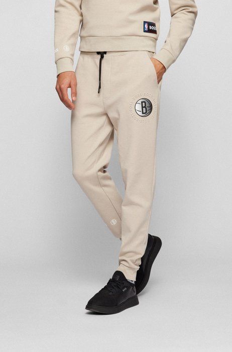 BOSS & NBA cotton-blend tracksuit bottoms with bold branding, NBA NETS