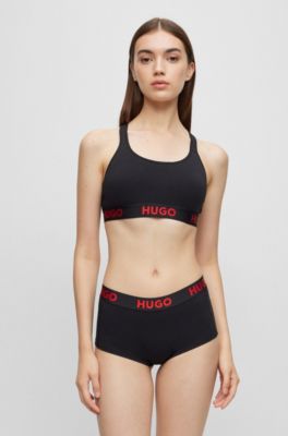 Cross-back bralette in stretch cotton with logo band, Black