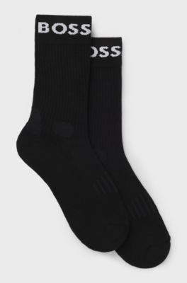 Paquete de dos pares de calcetines de tejido el&aacute;stico de largo normal, Negro