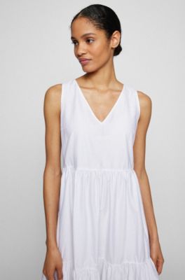 white tiered sleeveless dress