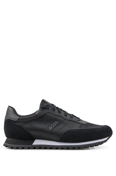 Running-style trainers in mixed materials with raised logo, Black