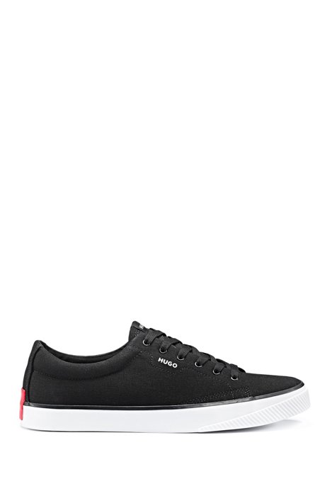 Canvas trainers with red logo patch and rubber sole, Black