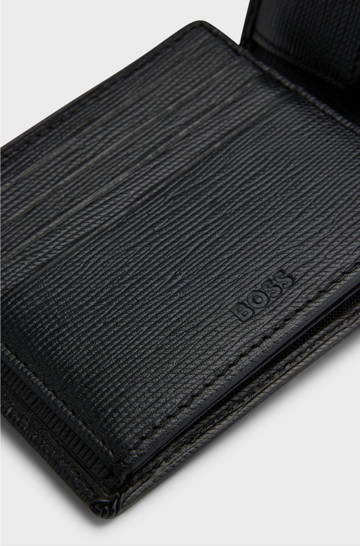 Embossed Italian-leather trifold wallet with logo plate, Black