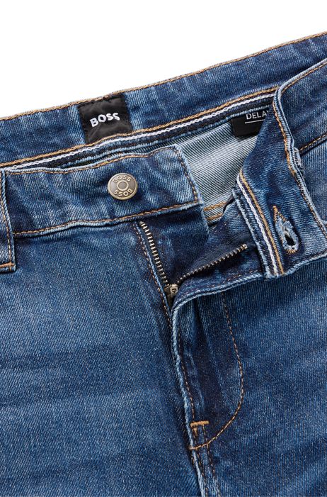 Sandy Plons jacht BOSS - Slim-fit jeans in blue comfort-stretch denim