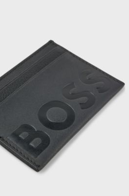 Pasjeshouder van generfd leer met reli&euml;flogo, Zwart