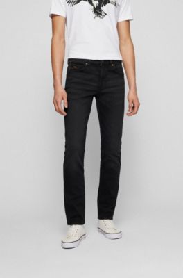 BOSS - Calças de ganga com ajuste slim em ganga super elástica em preto ...