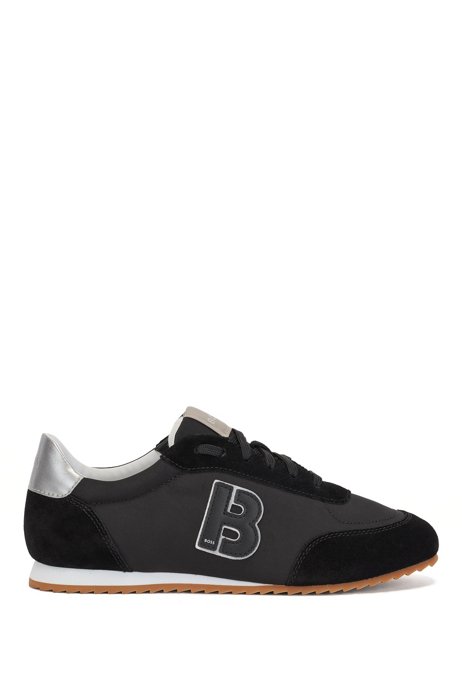 Low-top trainers in mixed materials with B patch, Black