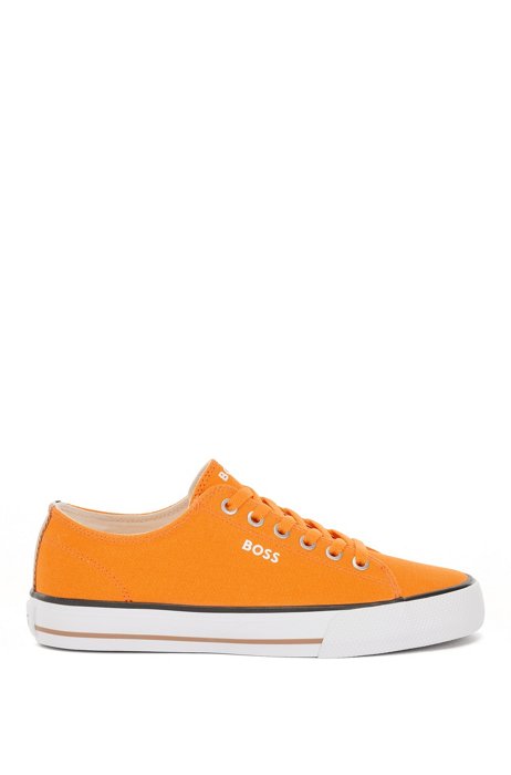 Lowtop Sneakers aus Canvas mit charakteristischen Streifen, Orange