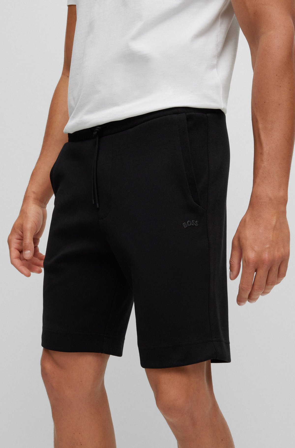 Mixed-material regular-fit shorts with curved logo, Black