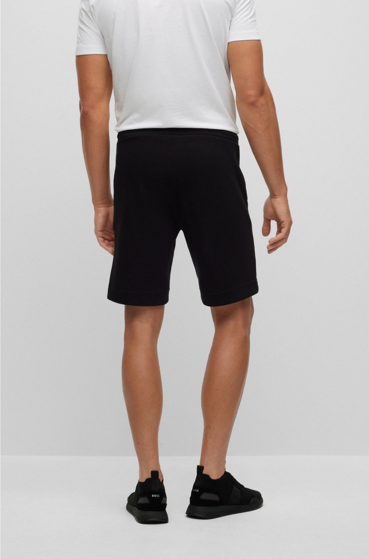 Mixed-material regular-fit shorts with curved logo , Black
