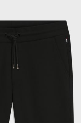 Cotton-terry tracksuit bottoms with printed logo, Black