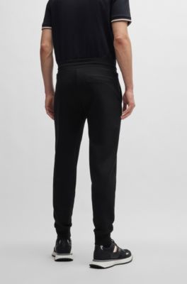 Cotton-terry tracksuit bottoms with printed logo, Black