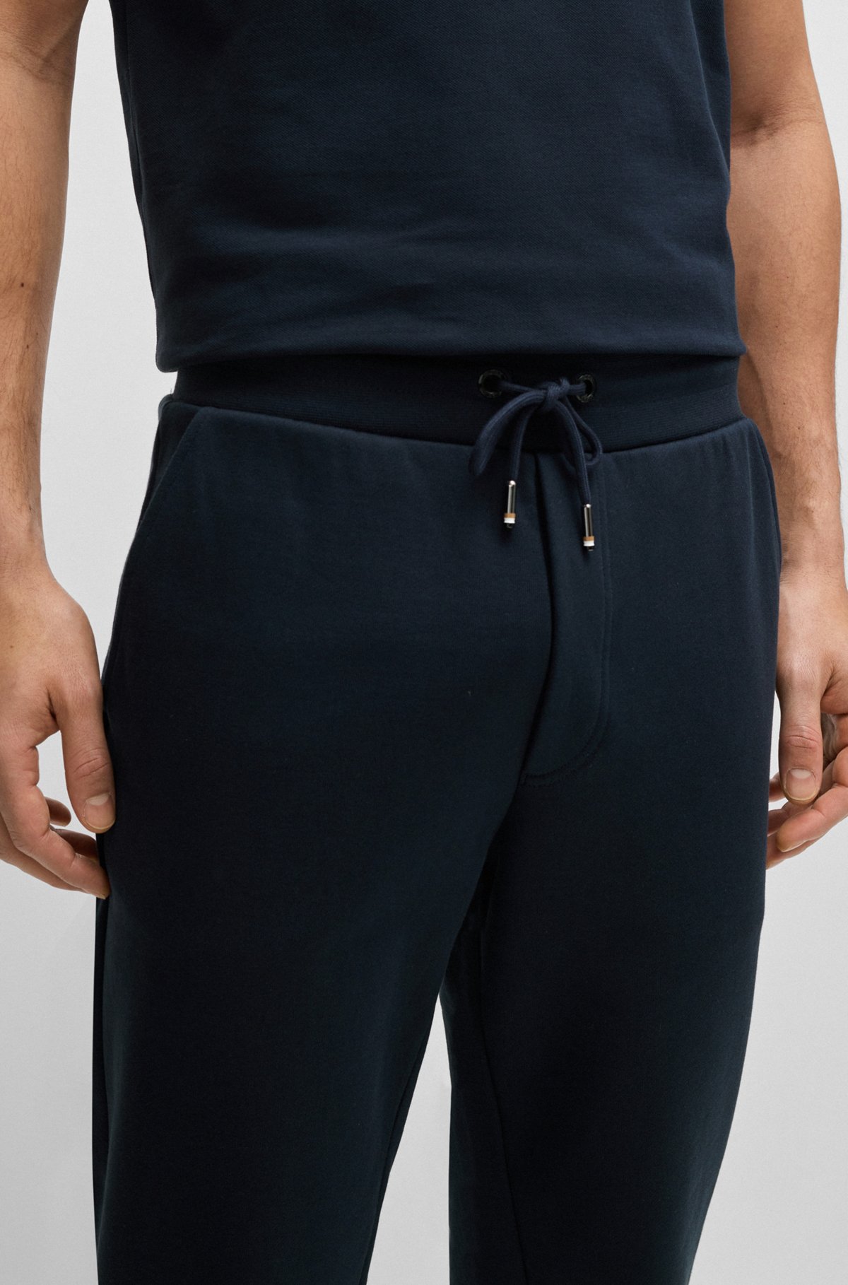 Cotton-terry tracksuit bottoms with printed logo, Dark Blue