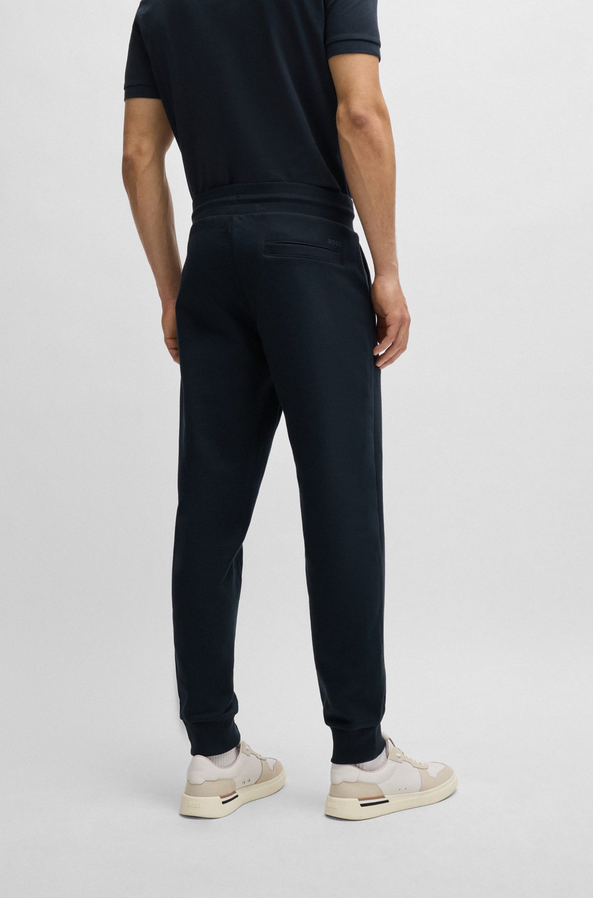 Cotton-terry tracksuit bottoms with printed logo, Dark Blue