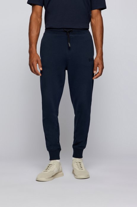 Relaxed-fit tracksuit bottoms with metallic logo, Dark Blue