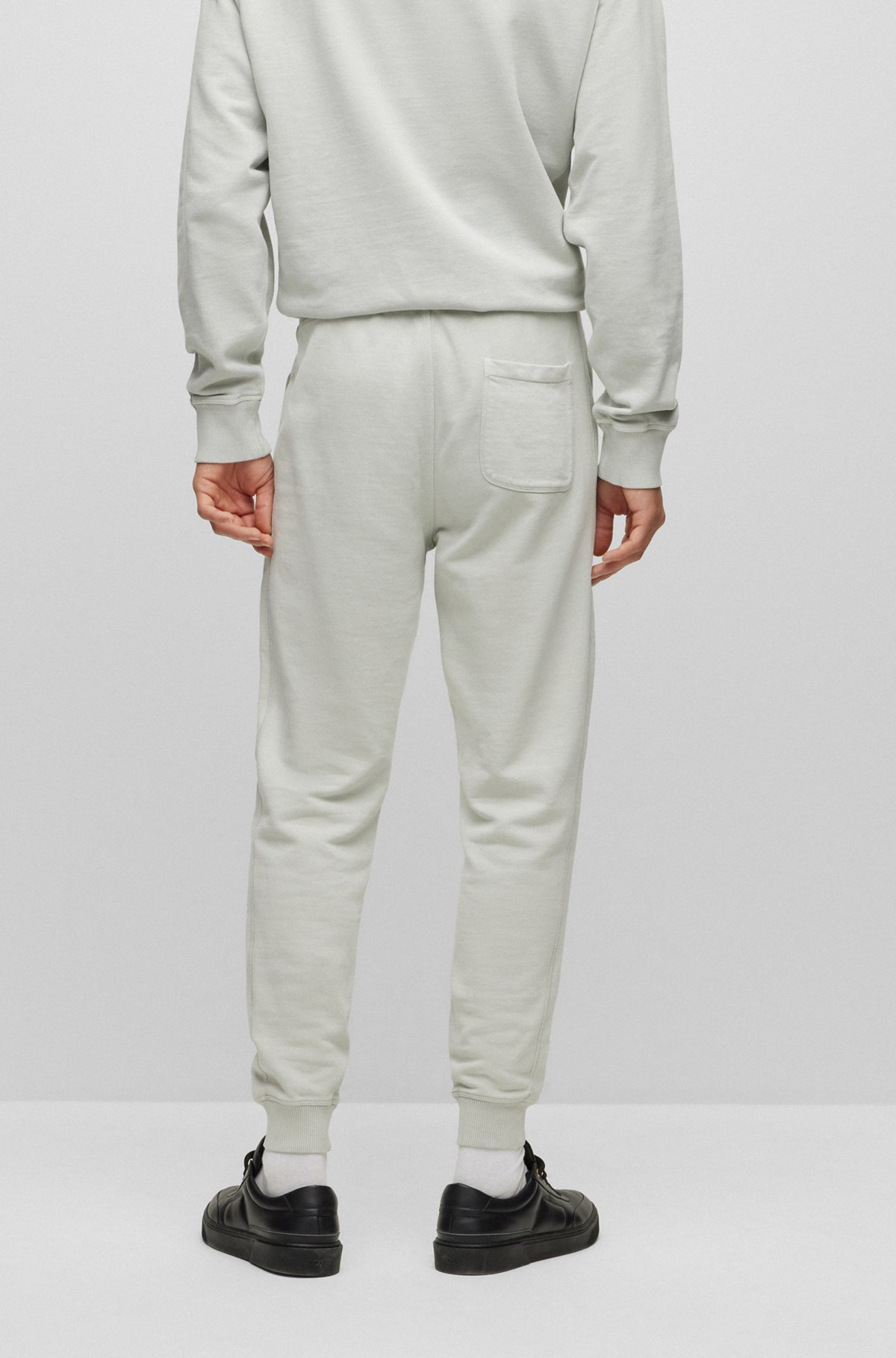 Relaxed-fit tracksuit bottoms in French-terry cotton, Light Grey