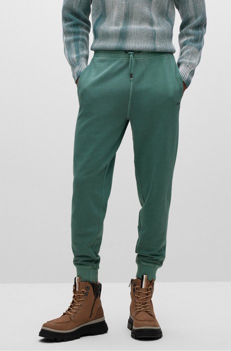 Relaxed-fit tracksuit bottoms in French-terry cotton, Green