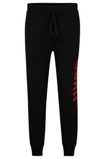 Cuffed tracksuit bottoms in French terry with contrast logo, Hugo boss