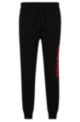 Drawstring tracksuit bottoms in French terry with large logo, Black
