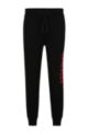 Drawstring tracksuit bottoms in French terry with large logo, Black