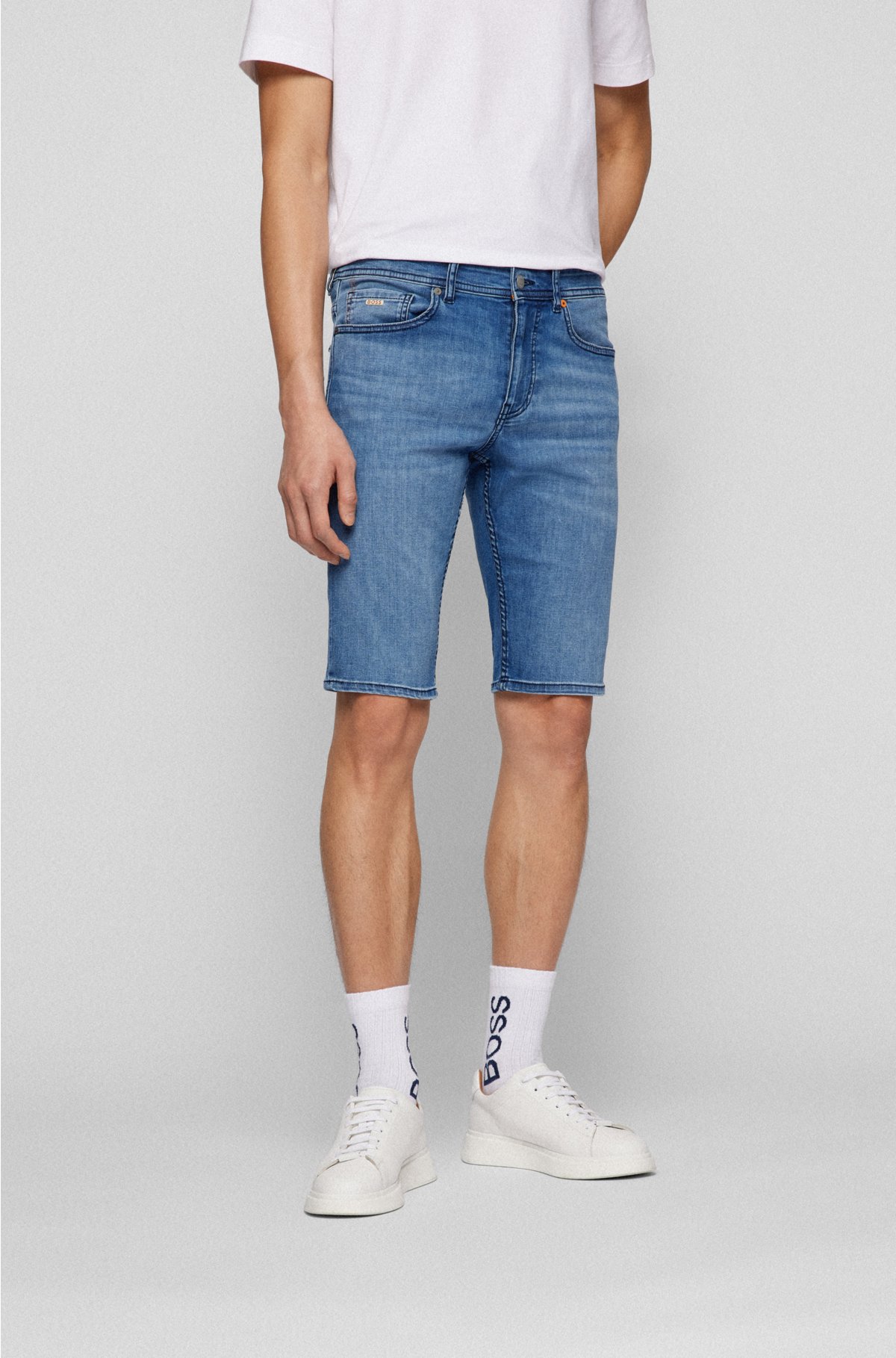 BOSS - Tapered-fit shorts in blue super-stretch denim