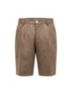 Tapered-fit shorts with pleat front in linen blend, Green
