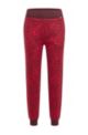 Relaxed-fit tracksuit bottoms with heart motif, Red Patterned