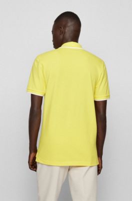 mustard polo shirt