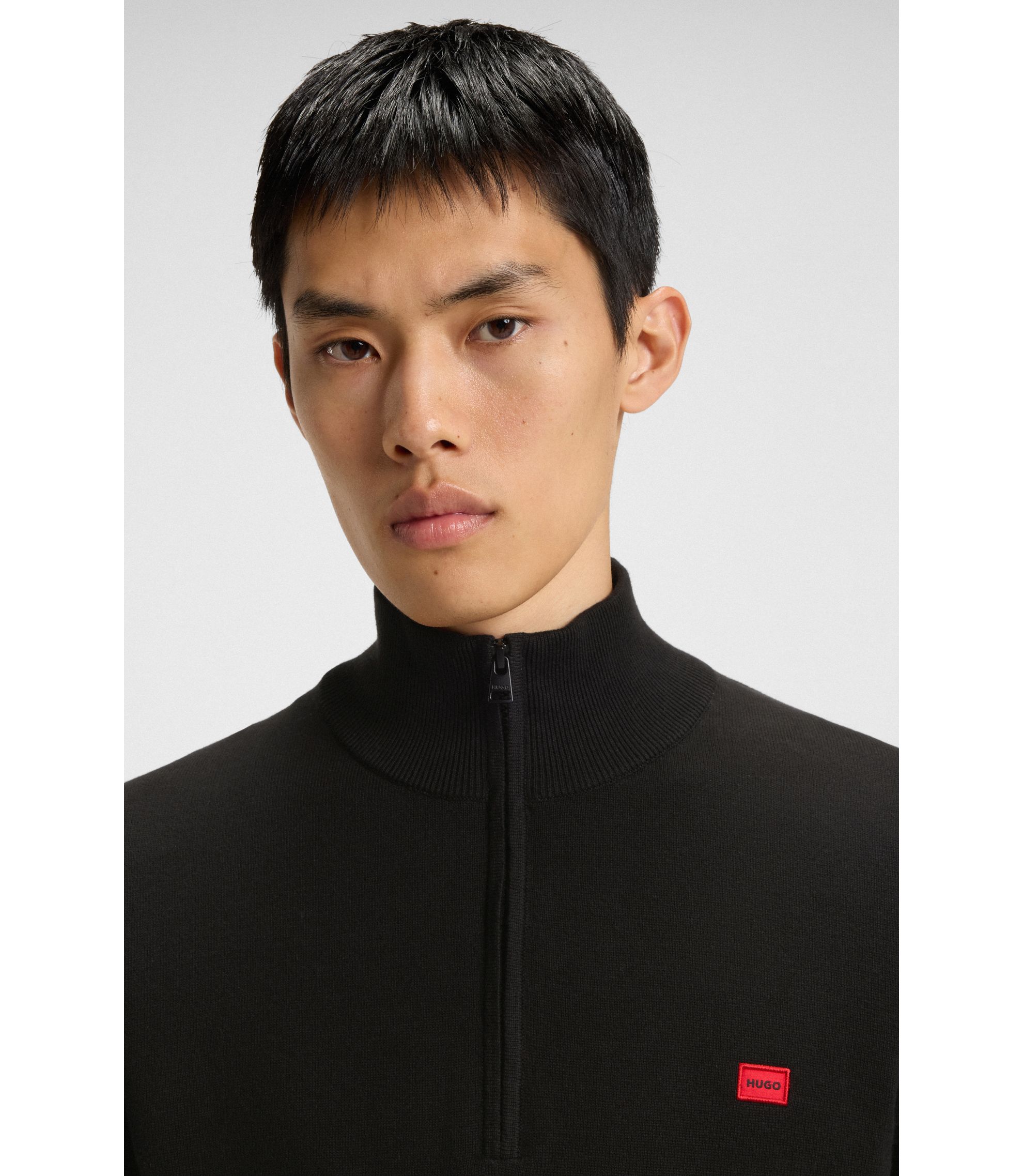 HUGO - Zip-neck sweater in cotton with red logo label - Black