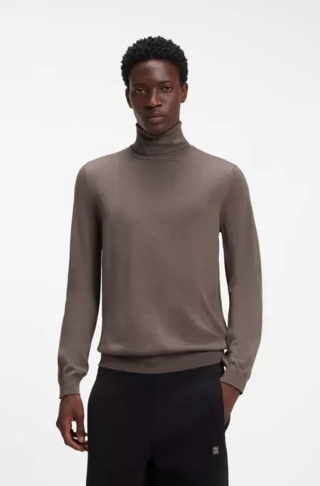 Pull à col roulé en laine mérinos avec logo brodé