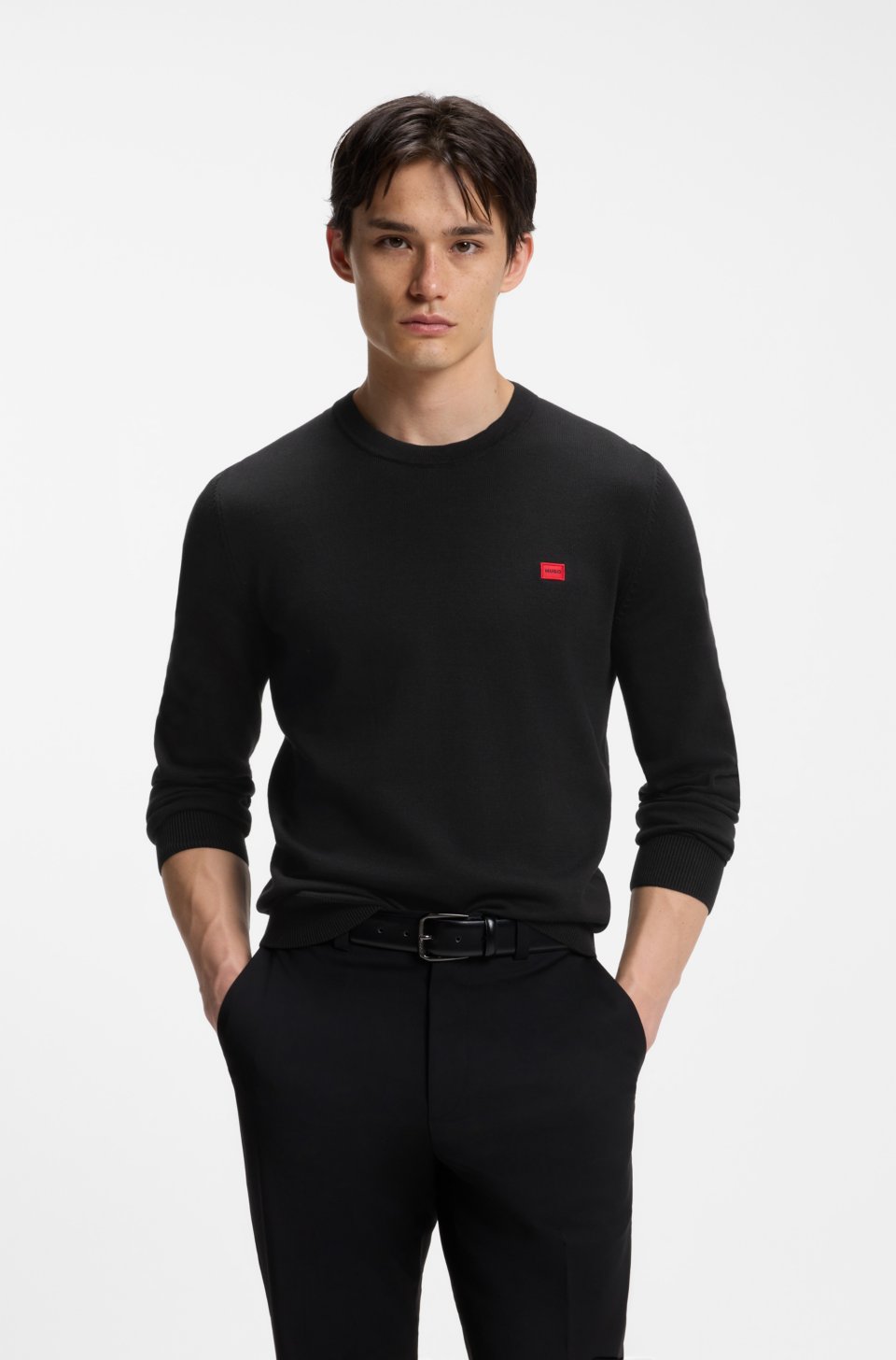 Cotton sweater with red logo label