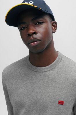 HUGO Knitted cotton sweater with red logo label