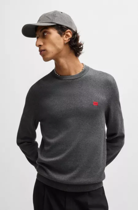 Cotton sweater with red logo label