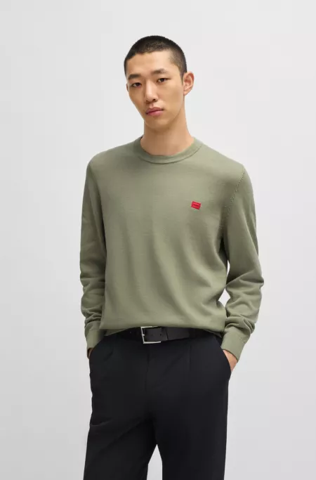 Cotton sweater with red logo label