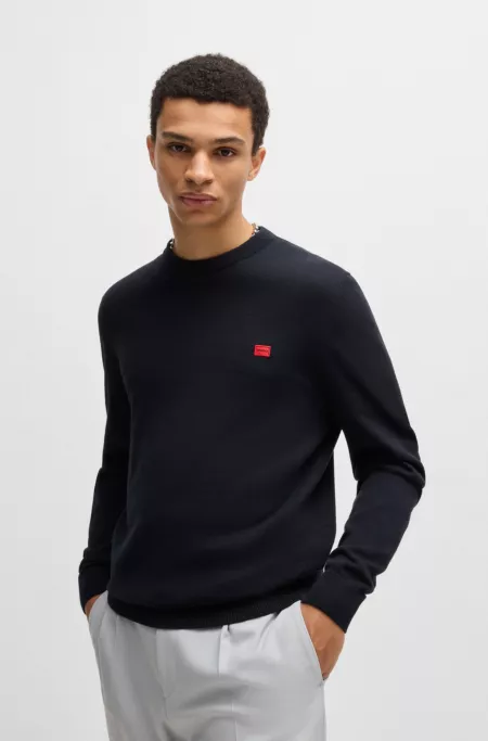 Cotton sweater with red logo label