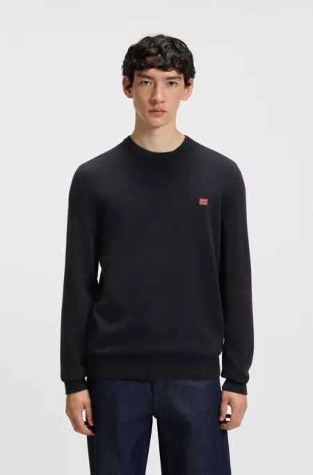 Cotton sweater with red logo label