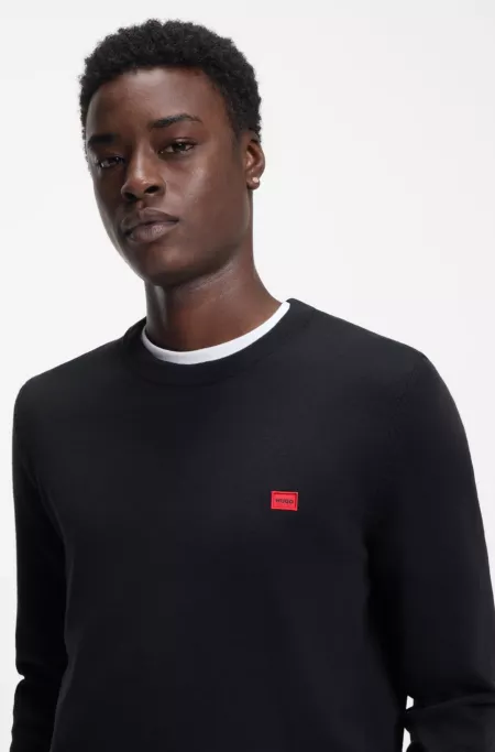 Cotton sweater with red logo label