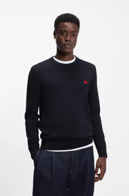 Cotton sweater with red logo label