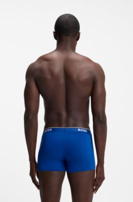 Eng anliegende Boxershorts aus Stretch-Baumwolle mit kurzem Bein und fortlaufenden Logos, Blau / Grau