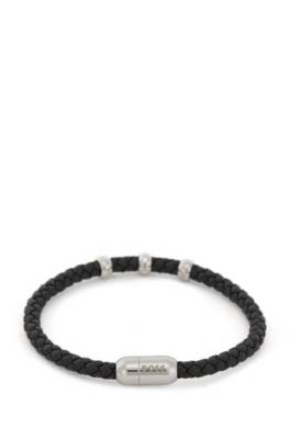 Bracelet en cuir tressé avec fermoir magnétique logoté