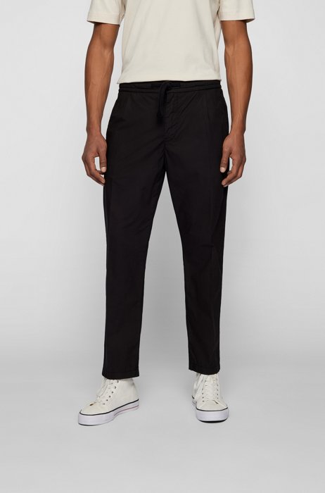 Tapered-Fit Hose in Cropped-Länge aus überfärbter Baumwolle, Schwarz