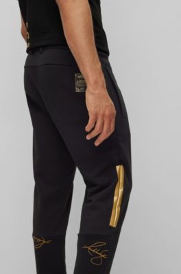 hugo boss black and gold tracksuit bottoms