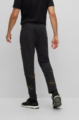 hugo boss black and gold tracksuit bottoms