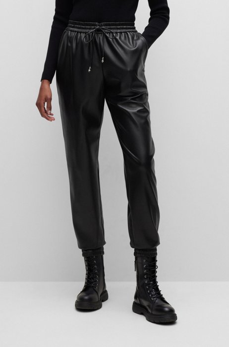 Regular-fit tracksuit bottoms in faux leather, Black