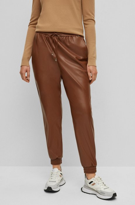 Regular-fit tracksuit bottoms in faux leather, Brown
