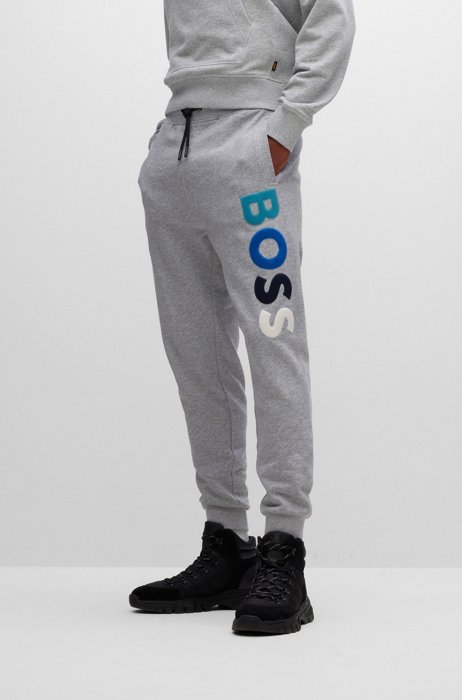 Cotton-terry tracksuit bottoms with fleece logo, Light Grey