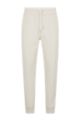 Cuffed tracksuit bottoms in a cotton blend with silk, White