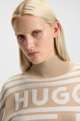 Oversized Pullover mit Stehkragen und Jacquard-Logos, Beige gemustert